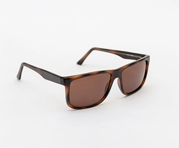 Modern brown sunglasses for eye protection, dark lenses, and a trendy look with a variety of designs.