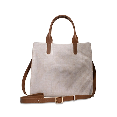 Enhance branded handbag images with background removal and professional retouching.